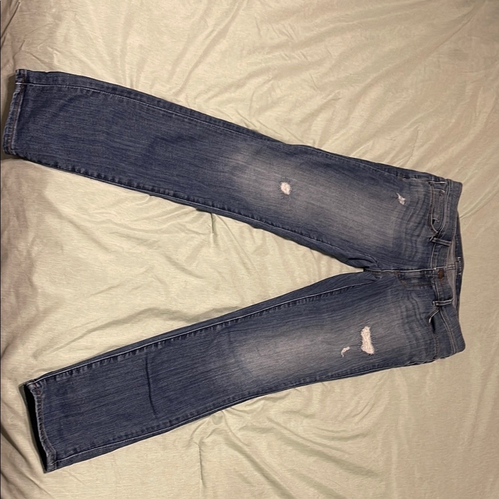 Distressed Blue Denim Jeans